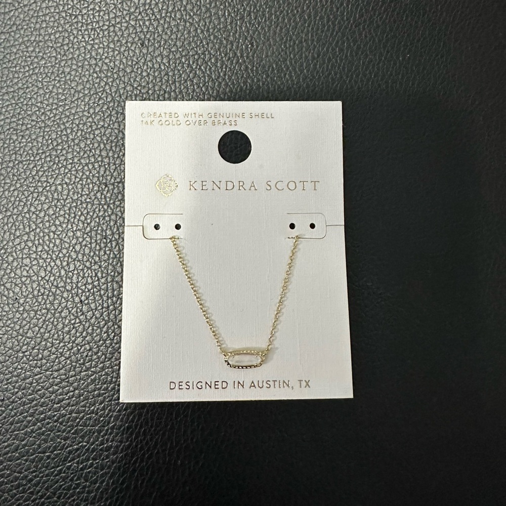 Gold Kendra Scott necklace